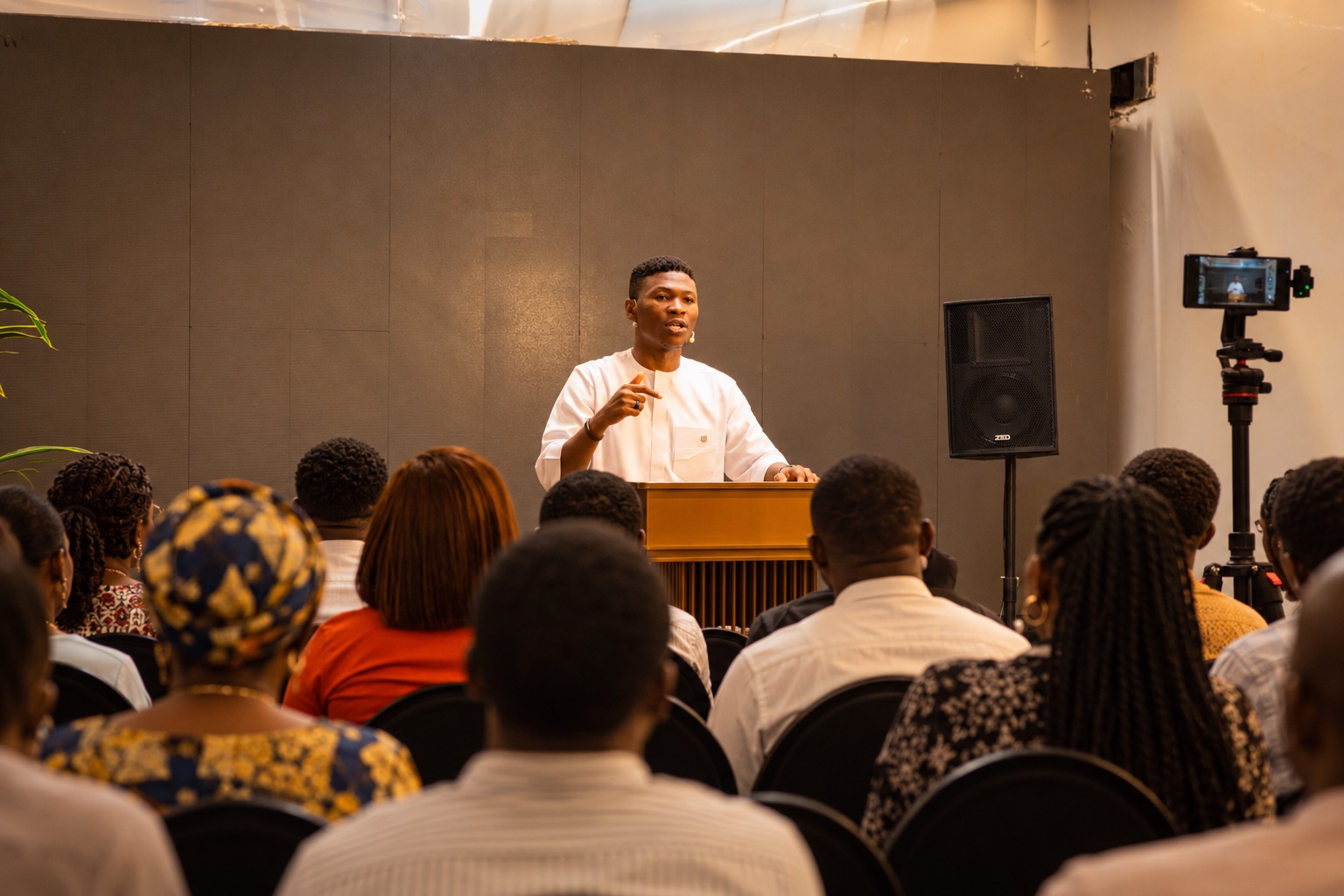 Pastor Joel Osoba teaching at a gathering